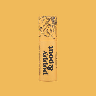 Orange cylindrical lip balm tube with floral line drawing and black text on matching orange background.