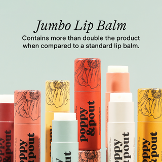 Colorful lip balm tubes with floral designs arranged together, showing jumbo size comparison to standard tubes.