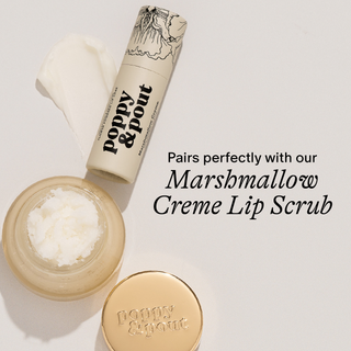 Poppy & Pout lip balm tube and open jar of marshmallow creme lip scrub on neutral background