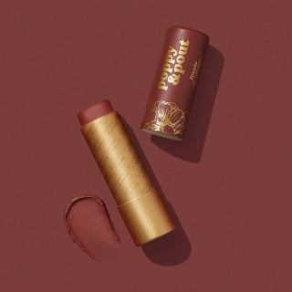 Poppy & Pout Roxie lip tint in gold tube with burgundy cap and product swatch displayed