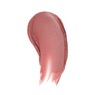 Poppy & Pout lip tint swatch showing creamy pink shimmer texture on white background