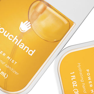 Touchland hand sanitizer bottles in orange packaging with rounded rectangular shape and pump dispensers