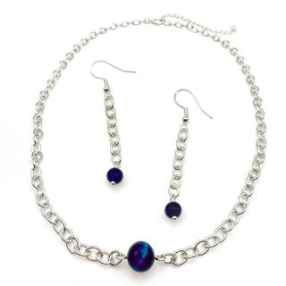 Silver chain necklace and matching dangle earrings set with dark blue beads