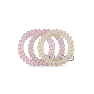 TELETIES Meadow Mist large spiral hair ties in translucent pink and cream colors on white background