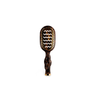 TELETIES Mini Vented Brush with tortoiseshell pattern, gold base, twisted handle, and wavy bristles.