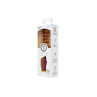 TELETIES Mini Vent Brush in retail packaging showing brush design and product features on box.