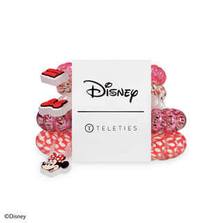 Disney Minnie Mouse hair ties in colorful patterns displayed in TELETIES packaging with elastic bands visible on sides.
