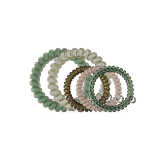 Set of five spiral coil hair ties in earthy and muted tones by TELETIES.