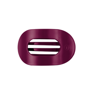 TELETIES flat round hair clip with open center design and signature grooved interior clasp.