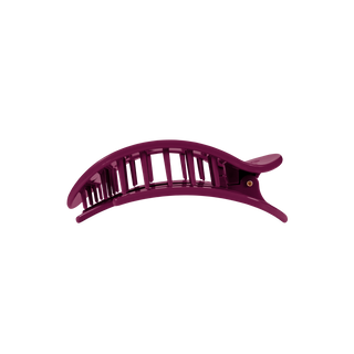 TELETIES medium flat round hair clip with open lattice design and curved banana shape.