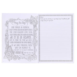 Coloring prayer journal with decorative floral border featuring the Lord's Prayer and lined writing space.