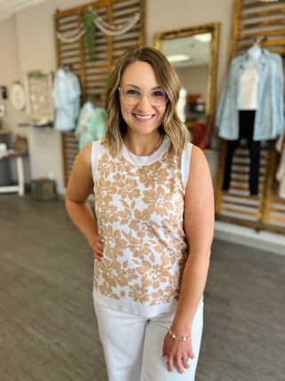Woman wearing STACCATO Natural Grace Floral Tank with beige floral pattern in retail boutique setting
