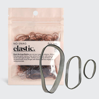 Package of no-snag elastic hair ties with brown elastics spilling out and floating beside package.