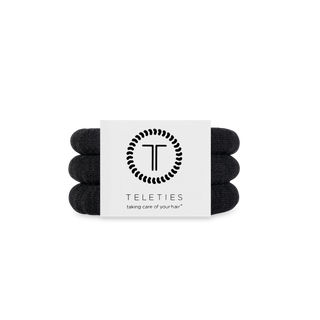 TELETIES small nylon hair ties in jet black displayed on packaging against dark background