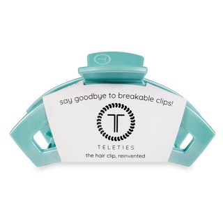 TELETIES large open hair clip in turquoise color with product packaging and branding visible.