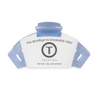 TELETIES open hair clip in transparent blue with product packaging and branding label