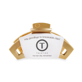 TELETIES open hair clip in gold packaging with white label displaying brand logo and product information.