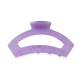 Purple translucent hair clip with curved design and teeth for securing hair