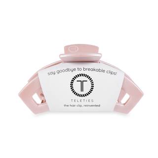 TELETIES open hair clip in pink with packaging displaying brand logo and "say goodbye to breakable clips" text