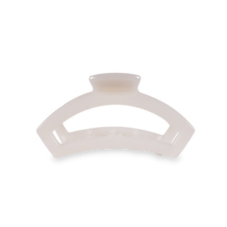 TELETIES open hair clip in curved design with smooth finish against black background