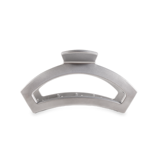 TELETIES open hair clip with curved design and textured finish on transparent background
