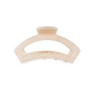 TELETIES open hair clip in translucent material with curved design and black grip pad