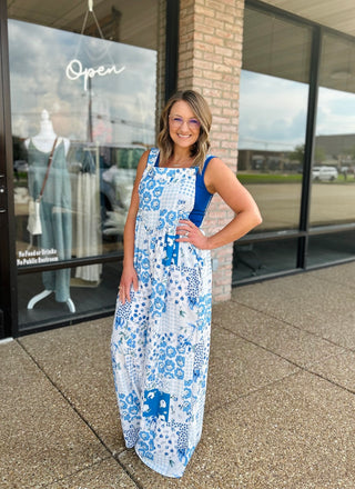 Woman wearing Haptics Patchwork Petals Wide Leg Overalls with floral and gingham print outside boutique.