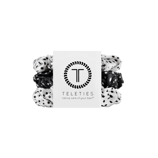 TELETIES polka dot silk scrunchies in black and white, stacked together on branded packaging card.