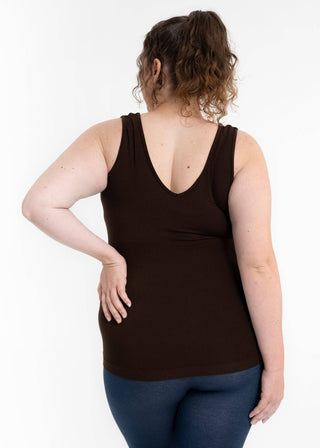 Woman wearing dark brown reversible cami tank top with deep V-back, shown from behind