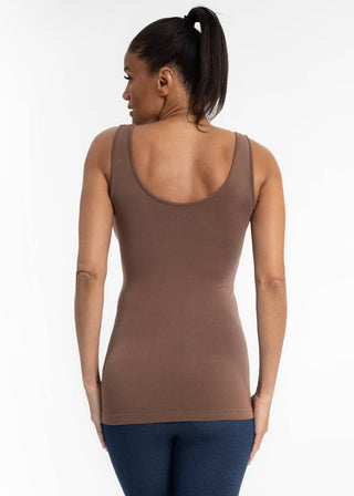 Woman wearing brown fitted tank top, shown from behind with hair in ponytail