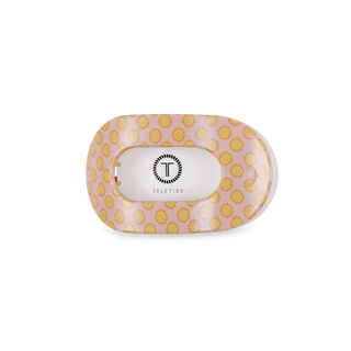 TELETIES round flat hair clip with pink background and yellow sunflower pattern