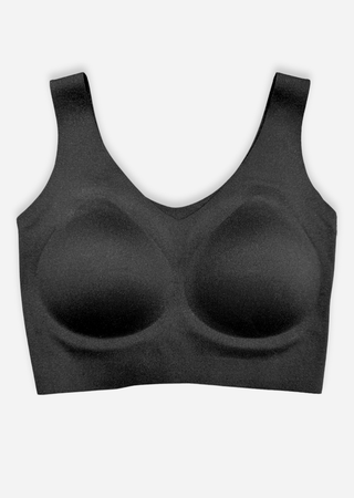 Black seamless wireless bra with molded cups and wide shoulder straps on white background.