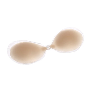 Silicone stick-on bra with clear straps and nude cups on white background
