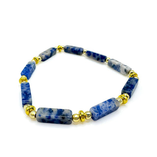 Alegria Accessories Skye Bracelet featuring rectangular sodalite stone beads alternating with gold accent beads.
