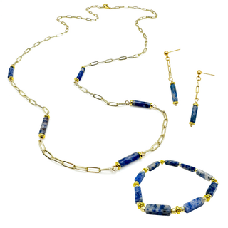 Sodalite stone and gold bead bracelet displayed alongside matching necklace and earring set.