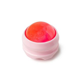 Pink shell-shaped body massager with coral-colored interior on white background