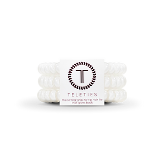TELETIES spiral hair coils package showing white hair ties with brand logo and tagline