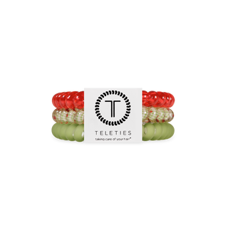 TELETIES spiral hair coils in various colors displayed in branded packaging