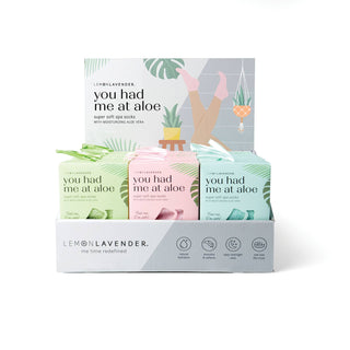 Lemon Lavender spa socks gift set with three colorful packages featuring aloe vera moisturizing treatment