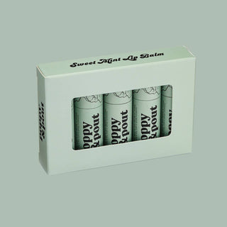 Poppy & Pout Sweet Mint Lip Balm four-pack in mint green packaging with window display box.