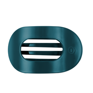 TELETIES large flat round hair clip with open center design and textured button closure.