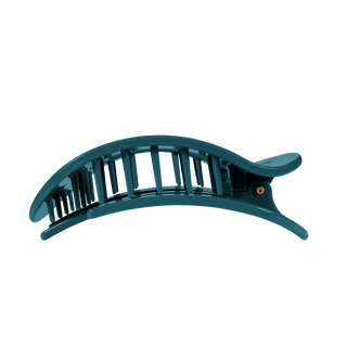 TELETIES large flat round hair clip with open grid design and signature pivot hardware detail.