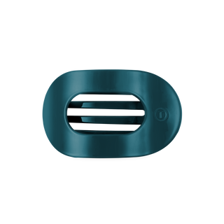 TELETIES flat round hair clip with open center design and textured button closure, shown from above.