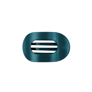 TELETIES small flat round hair clip with open oval design and ridged grip detail.