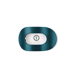 TELETIES small flat round hair clip with oval shape and branded logo on white center panel.