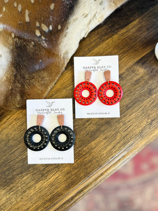 Harper Klay Co handcrafted Solstice earrings with geometric circular pendants and wooden studs on display cards