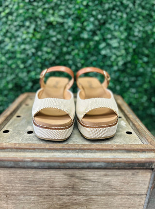 Corkys Treat Yourself Bourbon Combo Wedge sandals with textured platform sole on wooden surface
