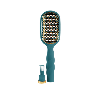 TELETIES Vented Hair Brush with gold-toned base, flexible bristles, and detachable cleaning tool on black background.