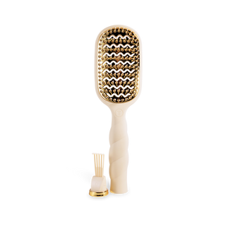 TELETIES vented paddle hair brush with gold bristles and ergonomic twisted handle, shown with replacement bristle tool.