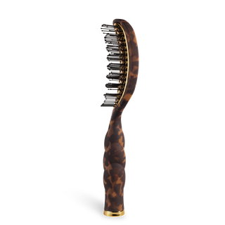 TELETIES vented hair brush with tortoiseshell pattern handle, gold accents, and dark bristles, side view.